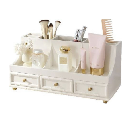 AERIN bamboo desktop beauty organizer for storing makeup and beauty products on a vanity.