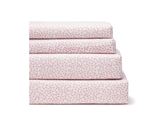 Petite Plume cotton bed sheets featuring a sweet heart print for a teen girl's bedroom.