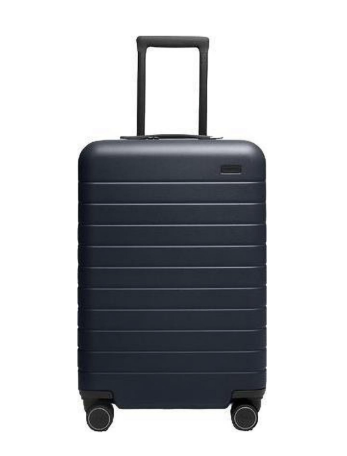 Away Carry-On Flex expandable suitcase, a practical travel gift for college guys visiting home and taking weekend trips.