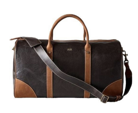 Men's leather weekender duffle bag for weekend trips and travel.